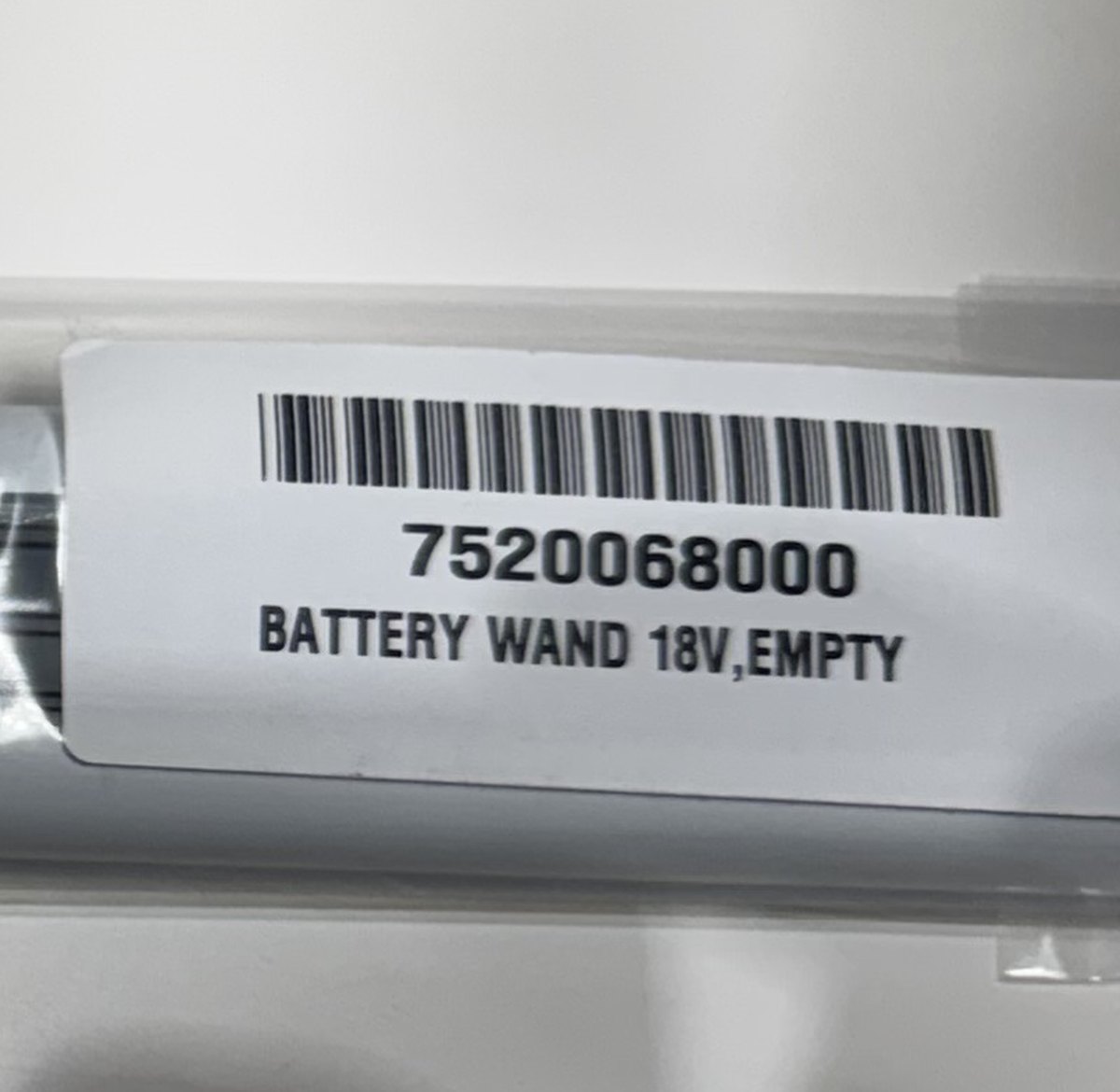 The label on a Hunter Douglas battery wand, reading part 7520068000, BATTERY WAND 18V
